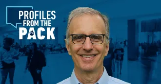 Photo of Joe Parisi with Profiles from the Pack logo.
