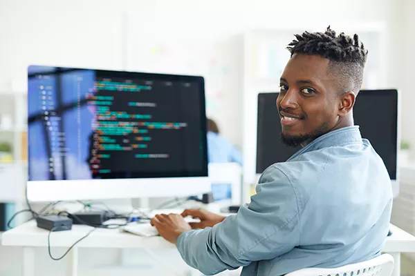 photo of a web developer working on a coding project
